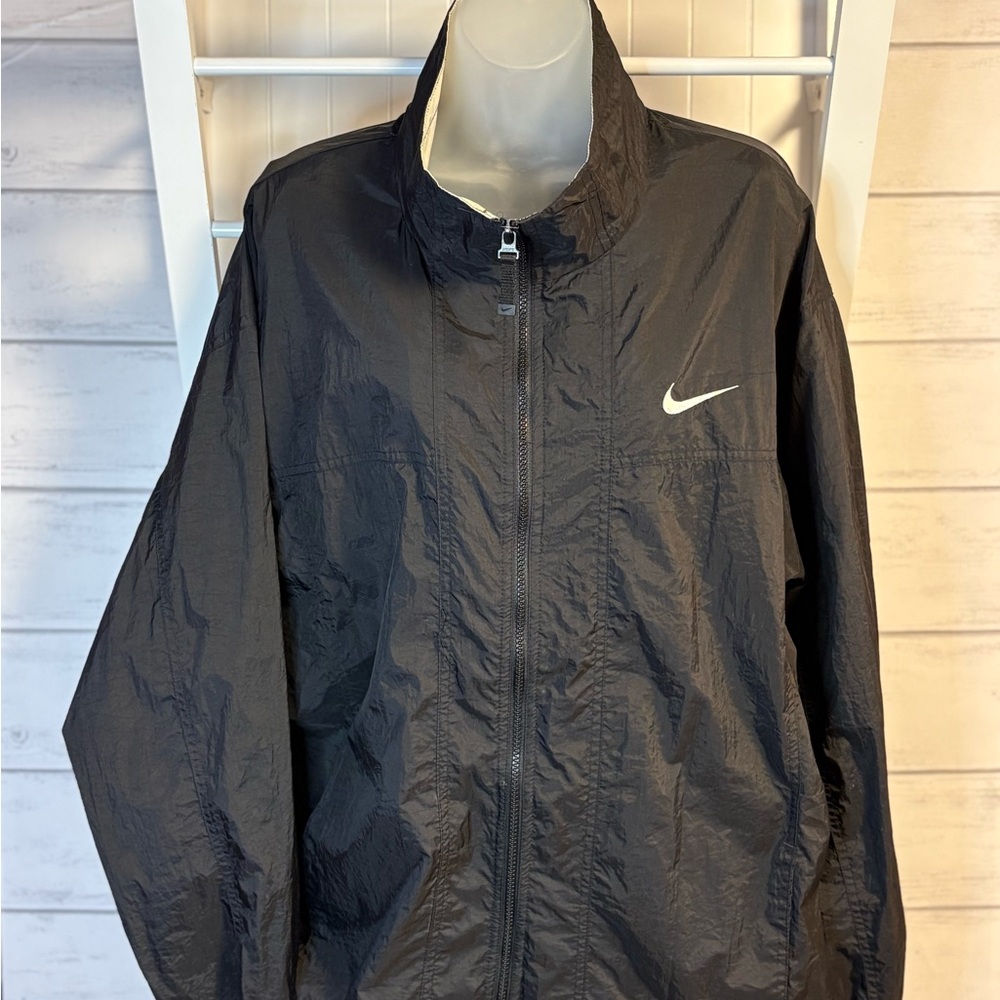Nike Black Men's Lightweight Windbreaker with White Swoosh
